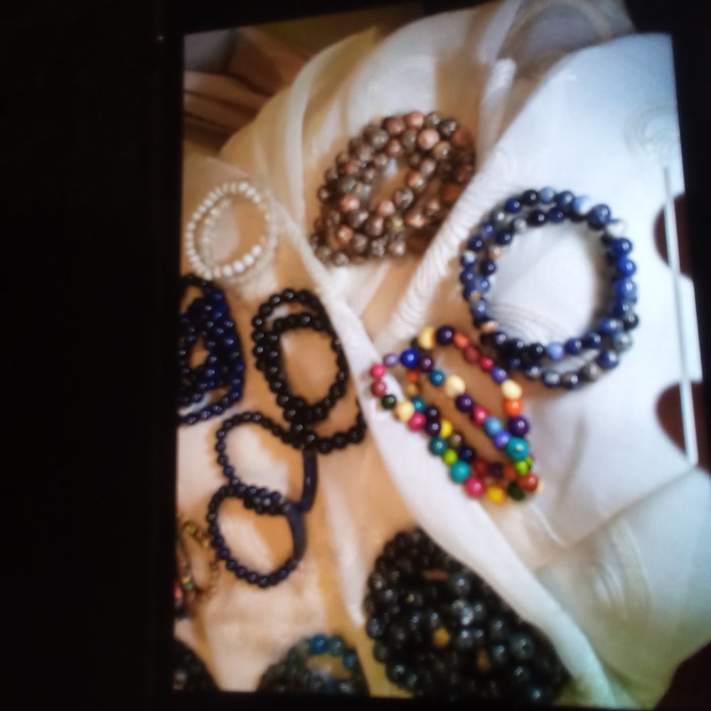 Group of 32 stone bracelets